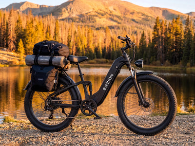 Eazion N9 Pro full suspension fat tire ebike loaded with 500 lb camping gear by mountain lake