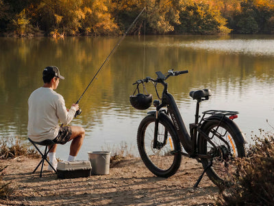 Outdoor enthusiast fishing lakeside with Eazion N9 Pro all terrain fat tire electric bike